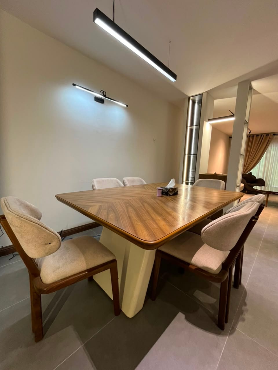 Walnut dining table for six in the three-bedroom apartment at MYG Nathiagali
